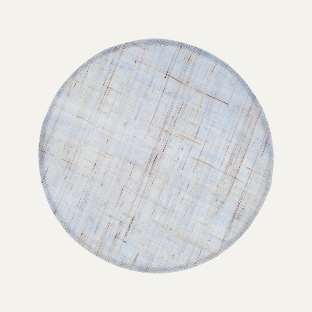 Light blue round linen placemat Linnea