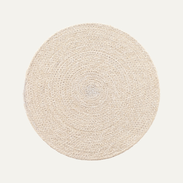 Round placemat Ella white. Made of jute.