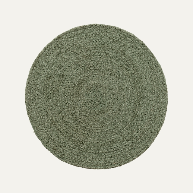 Round placemat Ella green. Made of jute.